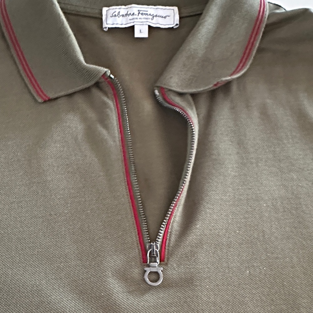 Salvatore Ferragamo Olive Polo with Red Trim. Some deodorant discoloration u-arm